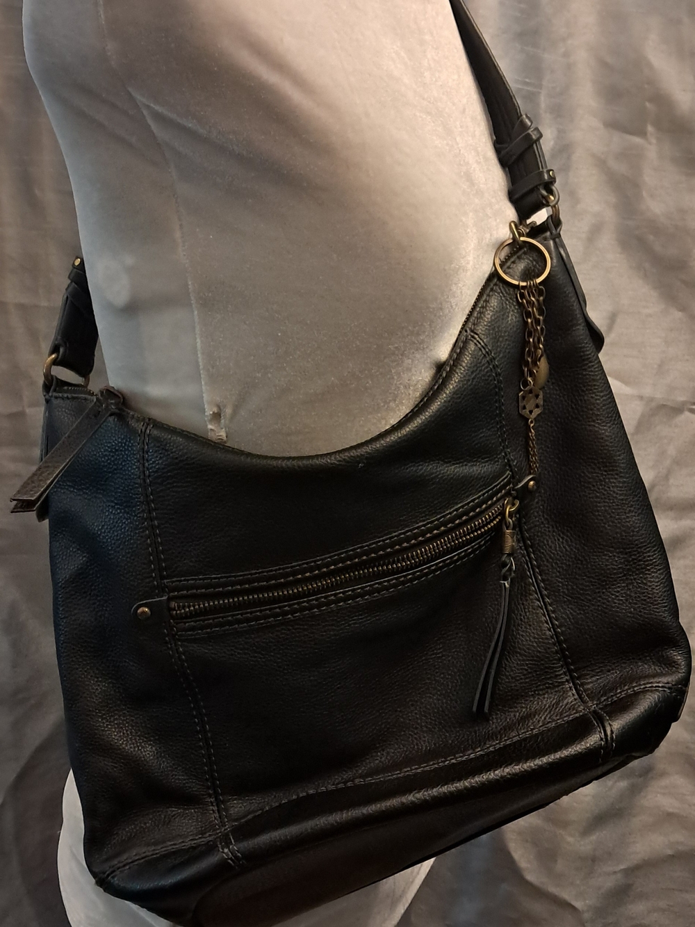 The Sak Black Pebbled Leather Hobo with Antique-Gold Hardware
